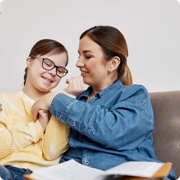 Planning documents and laptop on a desk